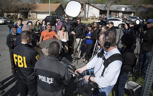 Authorities work on the scene after multiple explosions in Austin on Monday, March 12, 2018. (Ricardo B. Brazziell/Austin American-Statesman via AP) Authorities work on the scene after multiple explosions in Austin on Monday, March 12, 2018. (Ricardo B. Brazziell/Austin American-Statesman via AP)