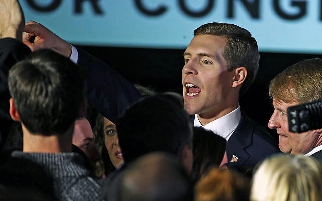 Conor Lamb, the Democratic candidate for the March 13 special election in Pennsylvania's 18th Congressional District, center, celebrates with his supporters at his election night party in Canonsburg, Pennsylvania, early Wednesday, March 14, 2018. (AP Photo/Gene J. Puskar) Conor Lamb, the Democratic candidate for the March 13 special election in Pennsylvania's 18th Congressional District, center, celebrates with his supporters at his election night party in Canonsburg, Pennsylvania, early Wednesday, March 14, 2018. (AP Photo/Gene J. Puskar)