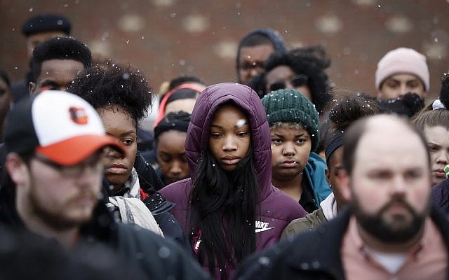 Students gather on their soccer field during a 17-minute walkout protest at the Stivers School for the Arts, March 14, 2018, in Dayton, Ohio. (AP Photo/John Minchillo) Students gather on their soccer field during a 17-minute walkout protest at the Stivers School for the Arts, March 14, 2018, in Dayton, Ohio. (AP Photo/John Minchillo)