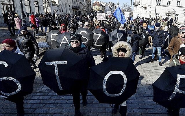 Warsaw residents with anti-racism banners protests the rise of hostility and anti-Semitism in Poland, March 17, 2018. (AP Photo/Czarek Sokolowski) Warsaw residents with anti-racism banners protests the rise of hostility and anti-Semitism in Poland, March 17, 2018. (AP Photo/Czarek Sokolowski)