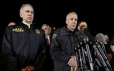 Interim Austin Police Chief Brian Manley, right, stands with other members of law enforcement as he briefs the media, Wednesday, March 21, 2018, in the Austin suburb of Round Rock, Texas. (AP Photo/Eric Gay)