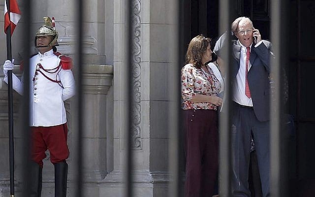 Peru's President Pedro Pablo Kuczynski talks on his cellphone as he leaves the Government Palace also known as the House of Pizarro, in Lima, Peru, Wednesday, March 21, 2018. (AP/Martin Mejia) Peru's President Pedro Pablo Kuczynski talks on his cellphone as he leaves the Government Palace also known as the House of Pizarro, in Lima, Peru, Wednesday, March 21, 2018. (AP/Martin Mejia)