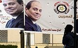Banners showing Egyptian President Abdel-Fattah el-Sissi hang in Tahrir Square, March 22, 2018. (AP Photo/Amr Nabil)