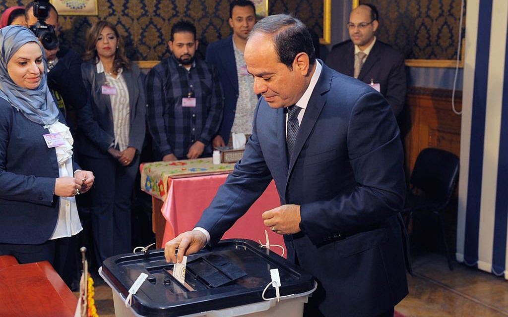 In this photo provided by Egypt's state news agency, MENA, Egyptian President Abdel-Fattah el-Sissi votes in Cairo, Egypt, March 27, 2018. (MENA via AP) In this photo provided by Egypt's state news agency, MENA, Egyptian President Abdel-Fattah el-Sissi votes in Cairo, Egypt, March 27, 2018. (MENA via AP)