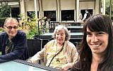 Provided by Daniel Knoll on Tuesday March 27, 2018, this photograph shows the late Mireille Knoll, center, with her son Daniel and granddaughter Jessica. (via Daniel Knoll via AP)