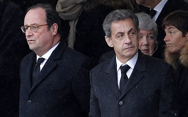 Former French Presidents Francois Hollande, left, and Nicolas Sarkozy wait prior to a national ceremony for Lt. Col. Arnaud Beltrame, Wednesday March 28, 2018 at the Hotel des Invalides in Paris. (AP Photo/Christophe Ena) Former French Presidents Francois Hollande, left, and Nicolas Sarkozy wait prior to a national ceremony for Lt. Col. Arnaud Beltrame, Wednesday March 28, 2018 at the Hotel des Invalides in Paris. (AP Photo/Christophe Ena)