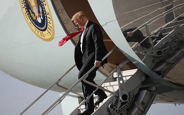 US President Donald Trump walks down the stairs of Air Force One during his arrival at Palm Beach International Airport, in West Palm Beach, Florida on March 29, 2018. Trump is spending the weekend at his his Mar-a-Lago estate. (AP Photo/Pablo Martinez Monsivais) US President Donald Trump walks down the stairs of Air Force One during his arrival at Palm Beach International Airport, in West Palm Beach, Florida on March 29, 2018. Trump is spending the weekend at his his Mar-a-Lago estate. (AP Photo/Pablo Martinez Monsivais)