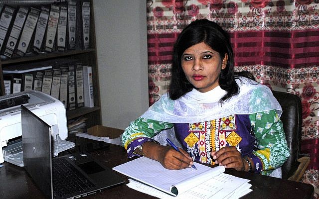 Krishna Kumari, from the Pakistani Hindu minority, works in her office in Hyderabad, Pakistan, February 12, 2018. (AP Photo/Pervez Masih) Krishna Kumari, from the Pakistani Hindu minority, works in her office in Hyderabad, Pakistan, February 12, 2018. (AP Photo/Pervez Masih)