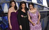 Ashley Judd, from left, Annabella Sciorra and Salma Hayek speak at the Oscars on Sunday, March 4, 2018, at the Dolby Theatre in Los Angeles. (Photo by Chris Pizzello/Invision/AP)
