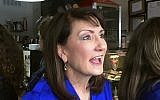 Democratic candidate for the 3rd congressional district Marie Newman speaks with supporters at a campaign event in LaGrange, Ill, on Feb. 13, 2018 (AP Photo/Sara Burnett).