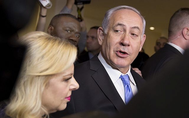Israel's Prime Minister Benjamin Netanyahu, accompanied by his wife Sara Netanyahu, responds to media questions after he visited the '3,000 years of history: Jews in Jerusalem' exhibit at United Nations headquarters, March 8, 2018. (AP Photo/Richard Drew) Israel's Prime Minister Benjamin Netanyahu, accompanied by his wife Sara Netanyahu, responds to media questions after he visited the '3,000 years of history: Jews in Jerusalem' exhibit at United Nations headquarters, March 8, 2018. (AP Photo/Richard Drew)
