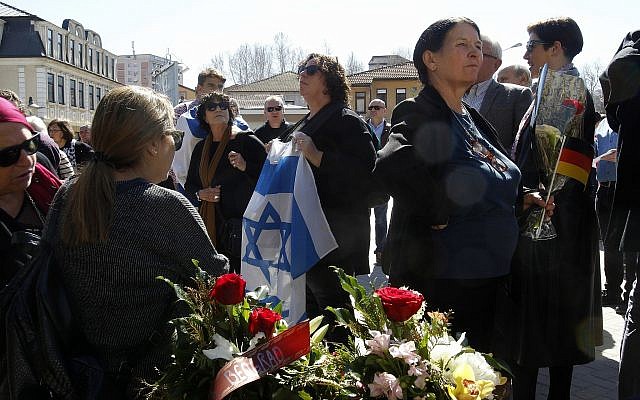 People gather to take part in the International March of the Living, through downtown Bitola, southern Macedonia, to commemorate the victims of the Holocaust, on March 11, 2018. (AP Photo/Boris Grdanoski)