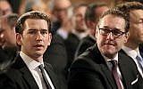 Austrian Chancellor Sebastian Kurz and Vice Chancellor Heinz-Christian Strache, from left, wait for the start of a commemoration on the occasion of the 80th anniversary of the connection to Hitler Germany, the so-called Anschluss, at the Hofburg palace in Vienna, Austria, Monday, March 12, 2018. (AP Photo/Ronald Zak)