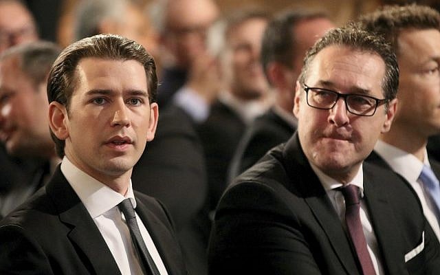 Austrian Chancellor Sebastian Kurz and Vice Chancellor Heinz-Christian Strache, from left, wait for the start of a commemoration on the occasion of the 80th anniversary of the connection to Hitler Germany, the so-called Anschluss, at the Hofburg palace in Vienna, Austria, Monday, March 12, 2018. (AP Photo/Ronald Zak) Austrian Chancellor Sebastian Kurz and Vice Chancellor Heinz-Christian Strache, from left, wait for the start of a commemoration on the occasion of the 80th anniversary of the connection to Hitler Germany, the so-called Anschluss, at the Hofburg palace in Vienna, Austria, Monday, March 12, 2018. (AP Photo/Ronald Zak)