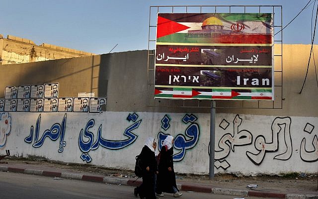 Palestinian school girls pass a billboard covered by national and Iranian flags with Arabic reading, "thanks and gratitude to Iran", in Gaza City, Wednesday, November 28, 2012. (AP/Adel Hana) Palestinian school girls pass a billboard covered by national and Iranian flags with Arabic reading, "thanks and gratitude to Iran", in Gaza City, Wednesday, November 28, 2012. (AP/Adel Hana)