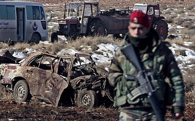 Illustrative: A Lebanese army soldier stands guard at the scene where a car bomb went off near a Hezbollah base near the village of Sbouba in the Baalbek region eastern Lebanon, early Tuesday, Dec. 17, 2013. (AP Photo/Bilal Hussein)