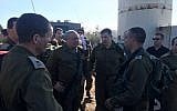 The March 17, 2018 photo shows IDF Chief of Staff Gadi Eisenkot (second from L) visitsing the scene of a car ramming attack in the northern West Bank that killed two soldiers and injured two others along with COGAT head Yoav Mordechai (second from R). (Credit: Israel Defense Forces)