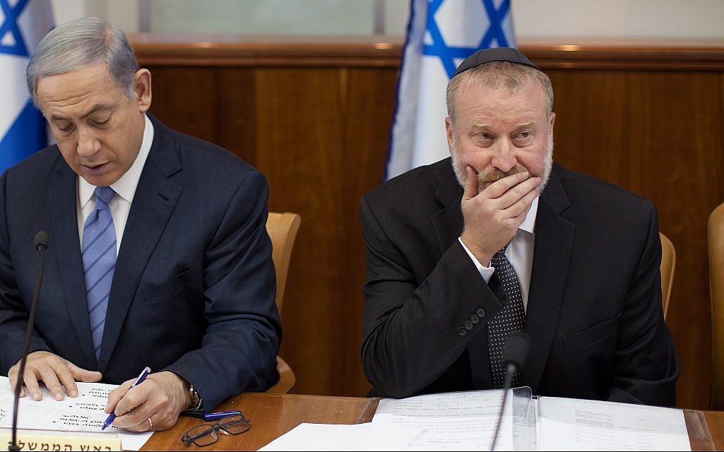 Prime Minister Benjamin Netanyahu (L) and then-cabinet secretary Avichai Mandelblit at the weekly cabinet meeting at the Prime Minister's Office in Jerusalem on July 5, 2015. (Emil Salman/Pool/Flash90)