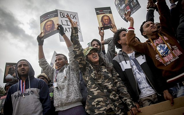 African migrants gather during a protest outside the Supreme Court in Jerusalem on January 26, 2017 (Yonatan Sindel/Flash90) African migrants gather during a protest outside the Supreme Court in Jerusalem on January 26, 2017 (Yonatan Sindel/Flash90)