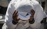 Members of the Ethiopian Jewish community in Israel take part in a prayer of the Sigd holiday on Armon Hanatziv Promenade overlooking Jerusalem on November 16, 2017 (Hadas Parush/Flash90)