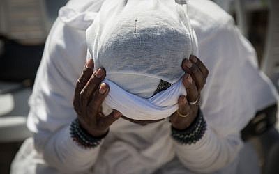 Members of the Ethiopian Jewish community in Israel take part in a prayer of the Sigd holiday on Armon Hanatziv Promenade overlooking Jerusalem on November 16, 2017 (Hadas Parush/Flash90)