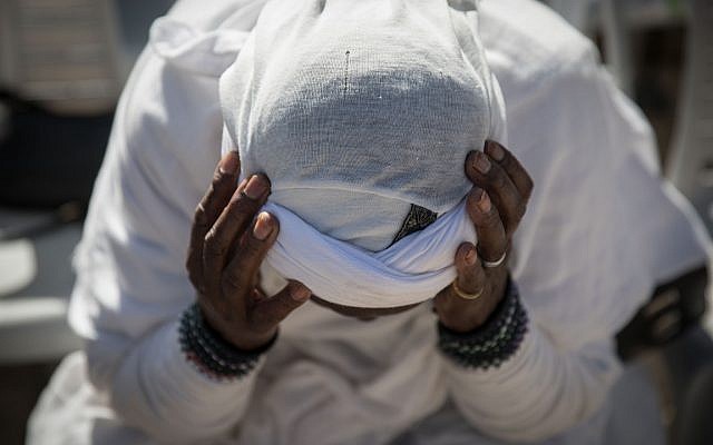 Members of the Ethiopian Jewish community in Israel take part in a prayer of the Sigd holiday on Armon Hanatziv Promenade overlooking Jerusalem on November 16, 2017 (Hadas Parush/Flash90) Members of the Ethiopian Jewish community in Israel take part in a prayer of the Sigd holiday on Armon Hanatziv Promenade overlooking Jerusalem on November 16, 2017 (Hadas Parush/Flash90)