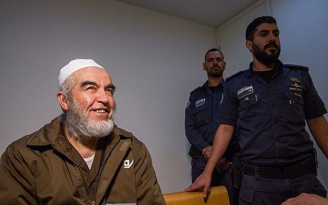 Leader of the northern branch of the Islamic Movement in Israel, Sheikh Raed Salah, arrives for a court hearing at the Haifa Magistrate's Court on February 26, 2018. (Flash90) Leader of the northern branch of the Islamic Movement in Israel, Sheikh Raed Salah, arrives for a court hearing at the Haifa Magistrate's Court on February 26, 2018. (Flash90)
