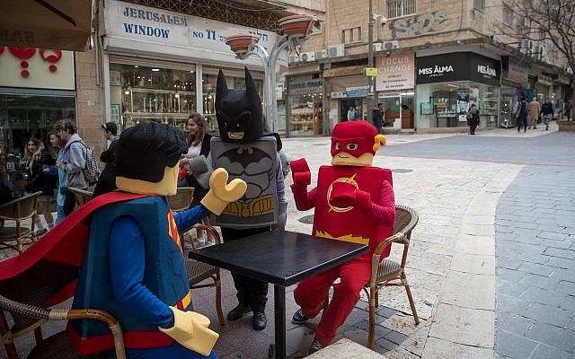 Israelis dressed up in costumes for the Jewish festival of Purim in downtown Jerusalem on February 27, 2018. (Yonatan Sindel/Flash90) Israelis dressed up in costumes for the Jewish festival of Purim in downtown Jerusalem on February 27, 2018. (Yonatan Sindel/Flash90)