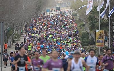 Thousands of runners take part in the international Jerusalem Marathon on March 9, 2018. (Yonatan Sindel/Flash90)
