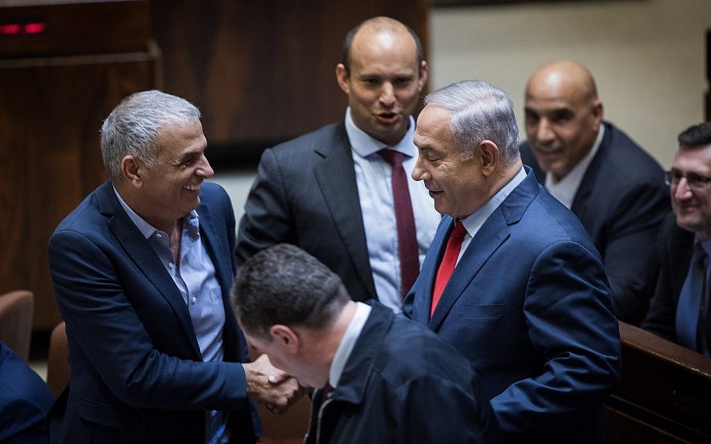 Moshe Kahlon, left, Naftali Bennett, center, and Benjamin Netanyahu in the Knesset on March 13, 2018. (Hadas Parush/Flash90)