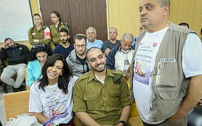 Former IDF soldier Elor Azaria, who was convicted of manslaughter for shooting dead an incapacitated Palestinian assailant in the West Bank city of Hebron, appears before a parole board in the army's Tel Aviv headquarters on March 14, 2018. (Flash90)