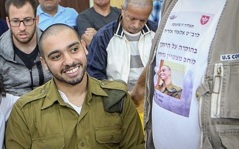 Former IDF soldier Elor Azaria, who was convicted of manslaughter for shooting dead an incapacitated Palestinian assailant in the West Bank city of Hebron, appears before a parole board in the army's Tel Aviv headquarters on March 14, 2018. (Flash90)