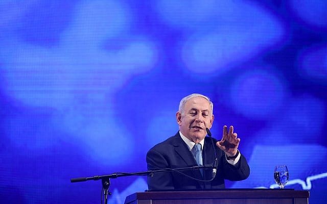 Prime Minister Benjamin Netanyahu speaks during a rally with his supporters and for the Jewish holiday of Passover in Tel Aviv, March 22, 2018. (Hadas Parush/Flash90) Prime Minister Benjamin Netanyahu speaks during a rally with his supporters and for the Jewish holiday of Passover in Tel Aviv, March 22, 2018. (Hadas Parush/Flash90)