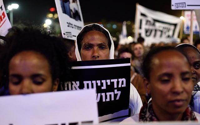 African asylum seekers protest against their deportation of asylum during a demonstration at Rabin Square in Tel Aviv, March 24, 2018. (Gili Yaari/Flash90) African asylum seekers protest against their deportation of asylum during a demonstration at Rabin Square in Tel Aviv, March 24, 2018. (Gili Yaari/Flash90)