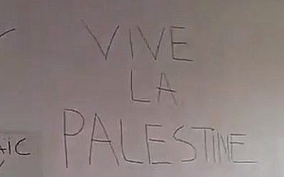 Screen capture from video showing anti-Israel graffiti found in the offices of the French Jewish Students Union at the Pantheon-Sorbonne campus of the University of Paris, March 28, 2018. (Twitter)