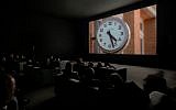 Christian Marclay's installation 'The Clock' at the Tel Aviv Museum of Art in 2018. (Courtesy Tel Aviv Museum of Art)