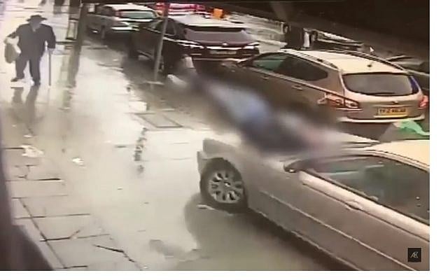 Screen capture from security video of a car crashing into pedestrians in the London Jewish neighborhood of Golders Green, March 28, 2018. (YouTube) Screen capture from security video of a car crashing into pedestrians in the London Jewish neighborhood of Golders Green, March 28, 2018. (YouTube)