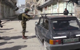 Footage of an IDF soldier stopping a Palestinian car in the West Bank city of Hebron on February 16, 2018. (YouTube screenshot)