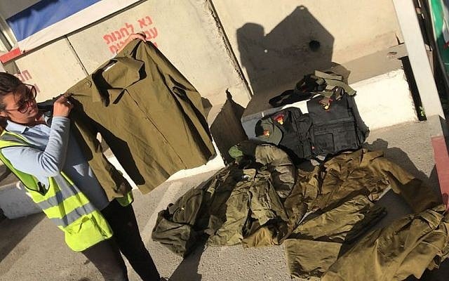IDF uniforms caught at the Kerem Shalom border crossing as they were being smuggled into Gaza. (Defense Ministry)