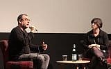 'Kipat Barzel' writer Avner Bernheimer (left) speaks with The Times of Israel's culture editor Jessica Steinberg about his TV series focusing on an ultra-Orthodox unit in the army, March 18, 2018 at the Jerusalem Cinematheque. (Daniel Laufer)