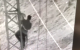 Israeli army security camera footage allegedly shows members of Hamas stealing electricity from power lines leading into the southern Gaza Strip on March 3, 2018. (Screen capture)