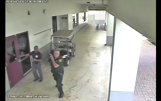 Security camera footage showing former deputy Scot Peterson did not enter Stoneman Douglas High School during a shooting there, in which 17 people were killed, on February 14, 2018. (Screen capture) Security camera footage showing former deputy Scot Peterson did not enter Stoneman Douglas High School during a shooting there, in which 17 people were killed, on February 14, 2018. (Screen capture)