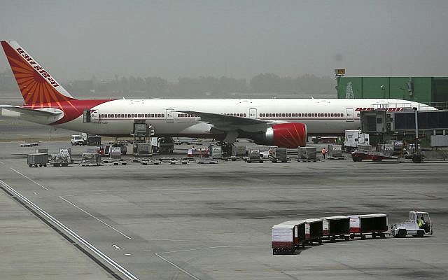 An Air India aircraft seen parked on the tarmac at Terminal 3 of Indira Gandhi International Airport in New Delhi, India, May 18, 2012. (AP Photo/Kevin Frayer) An Air India aircraft seen parked on the tarmac at Terminal 3 of Indira Gandhi International Airport in New Delhi, India, May 18, 2012. (AP Photo/Kevin Frayer)