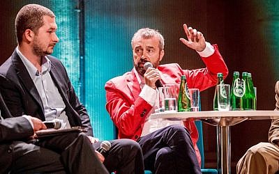 Bogdan Bialek, right, and Michal Jaskulski during a 2016 discussion in Warsaw about the film made about Bialek’s interfaith efforts in Poland. (Courtesy of the makers of 'Bogdan’s Journey)