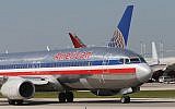 An American Airlines jet taxis at O’Hare International Airport in Chicago (Scott Olson/Getty Images via JTA)