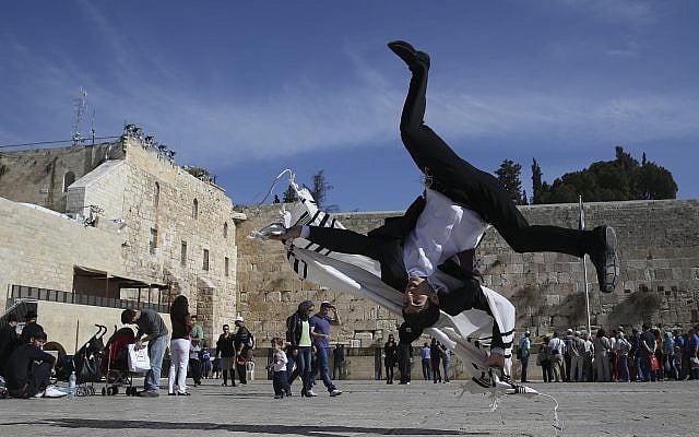 Ultra-Orthodox Hayat brothers practice Capoeira, a Brazilian martial art that combines elements of dance, acrobatics and music, in the Western Wall in Jerusalem's Old City. (Nati Shohat /FLASH90) Ultra-Orthodox Hayat brothers practice Capoeira, a Brazilian martial art that combines elements of dance, acrobatics and music, in the Western Wall in Jerusalem's Old City. (Nati Shohat /FLASH90)