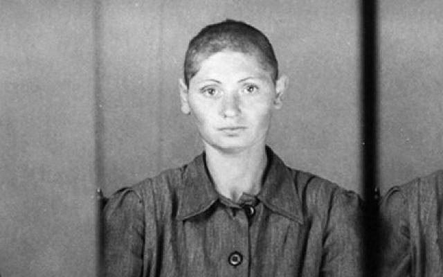 Jewish prisoner no. 13088, after her hair is shorn in Auschwitz. (Yad Vashem) Jewish prisoner no. 13088, after her hair is shorn in Auschwitz. (Yad Vashem)