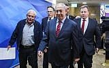 Prime Minister Benjamin Netanyahu arrives at the weekly cabinet meeting at the PM's office in Jerusalem, on March 25, 2018. (Marc Israel Sellem/POOL)