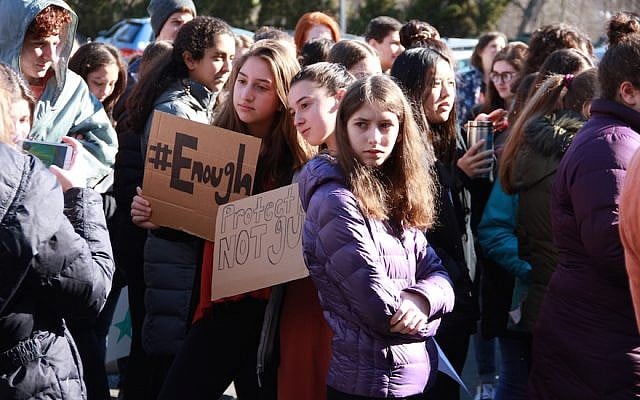 Students at the Golda Och Academy in West Orange, New Jersey, taking part in a walkout in honor of the victims of the Parkland, Florida school shooting, March 14, 2018. (Courtesy of Golda Och Academy) Students at the Golda Och Academy in West Orange, New Jersey, taking part in a walkout in honor of the victims of the Parkland, Florida school shooting, March 14, 2018. (Courtesy of Golda Och Academy)