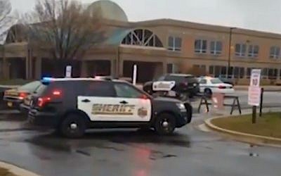 A police car parks outside of Great Mills High School in Maryland where a shooting was reported on March 20, 2018. (Screen capture/Twitter)
